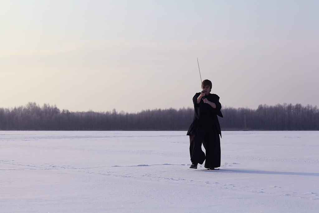 martial artist training in snow