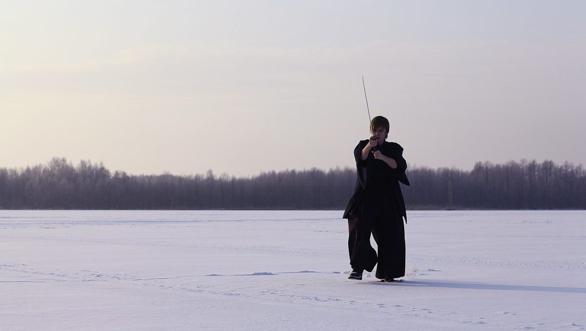 martial artist training in snow